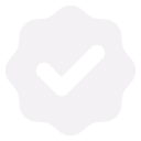 Pixelated icon featuring a black checkmark within a white, slightly rounded square, indicating success or completion.