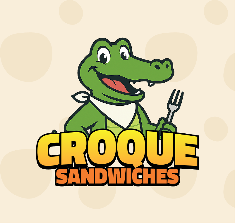 Logo for Croque Sandwiches, featuring a friendly green crocodile mascot wearing a bandana and holding a fork, standing behind the brand name.