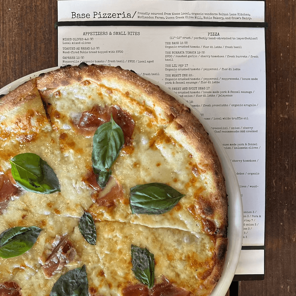 Pizza sitting on a menu