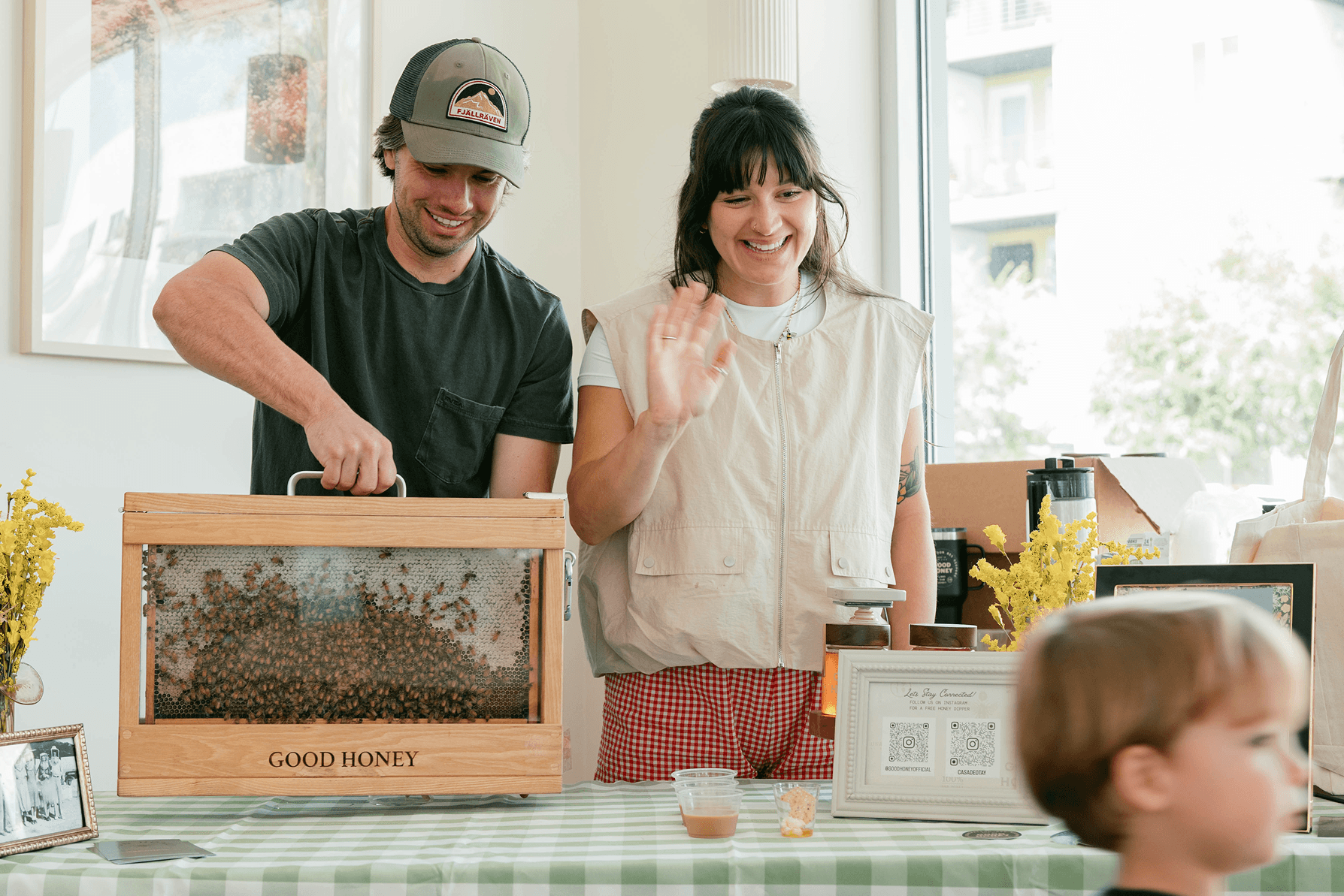 People standing in front of a step-and-repeat banner at We Are Viking Yoga