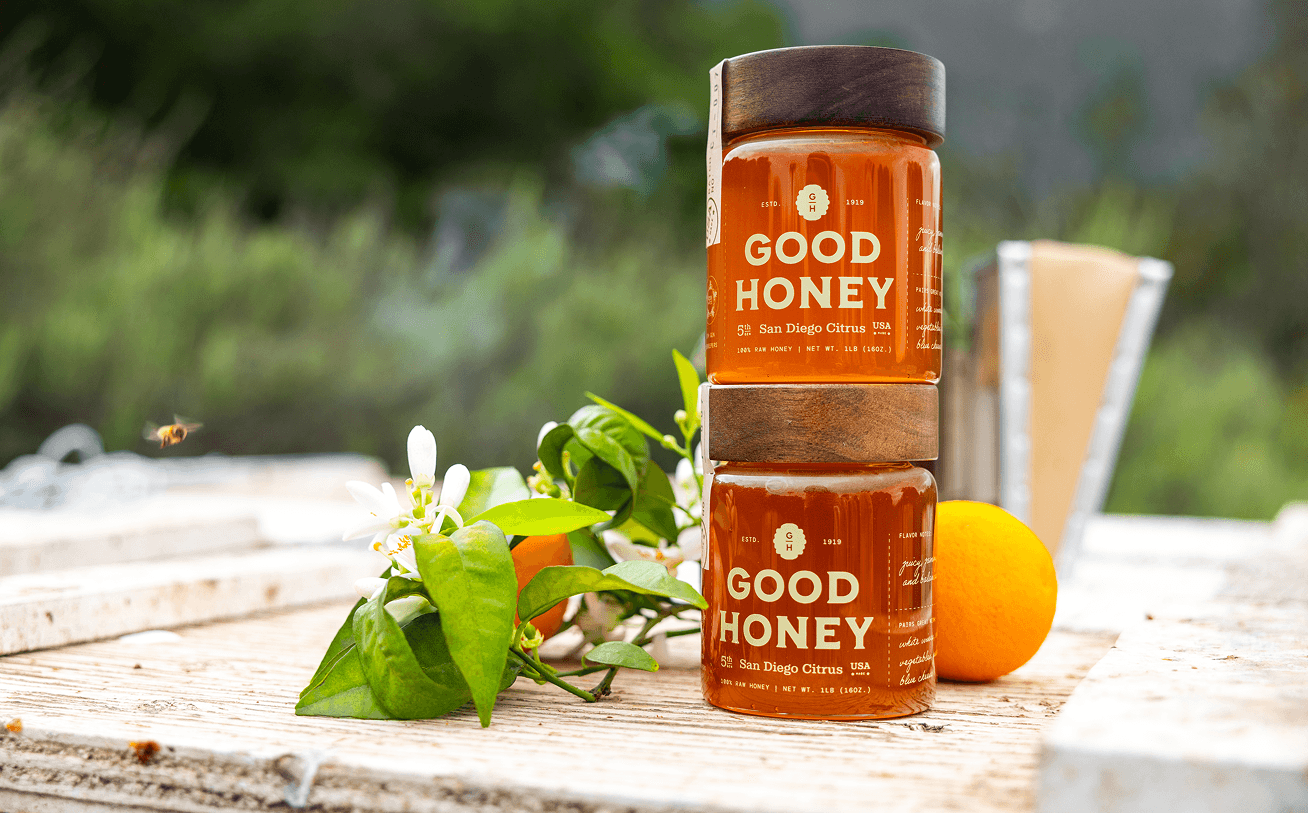 two jars of Good Honey San Diego Citrus stacked on top of one another