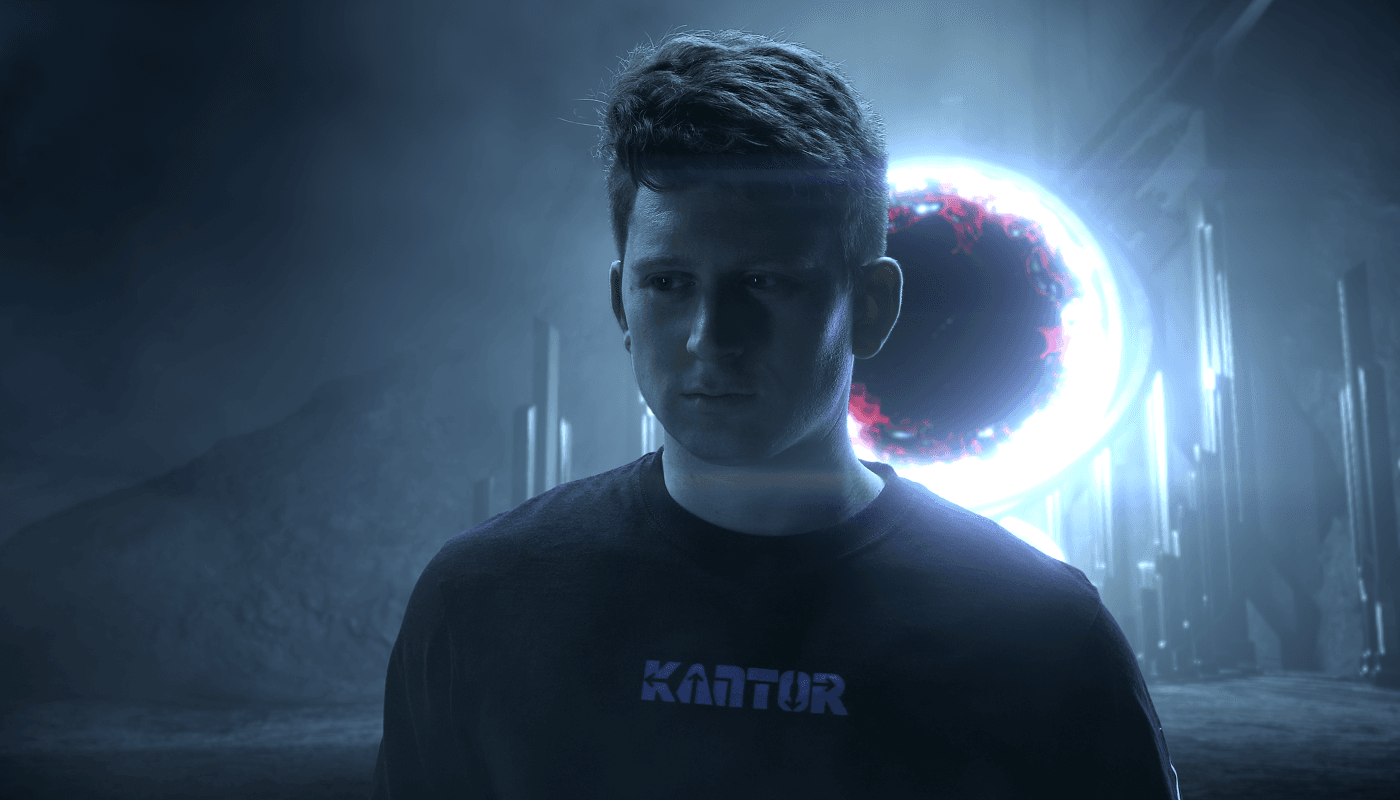 A young man in a dark KANTOR t-shirt stands in a misty, futuristic landscape, illuminated by a glowing, red-energy sphere and tall pillars behind him.